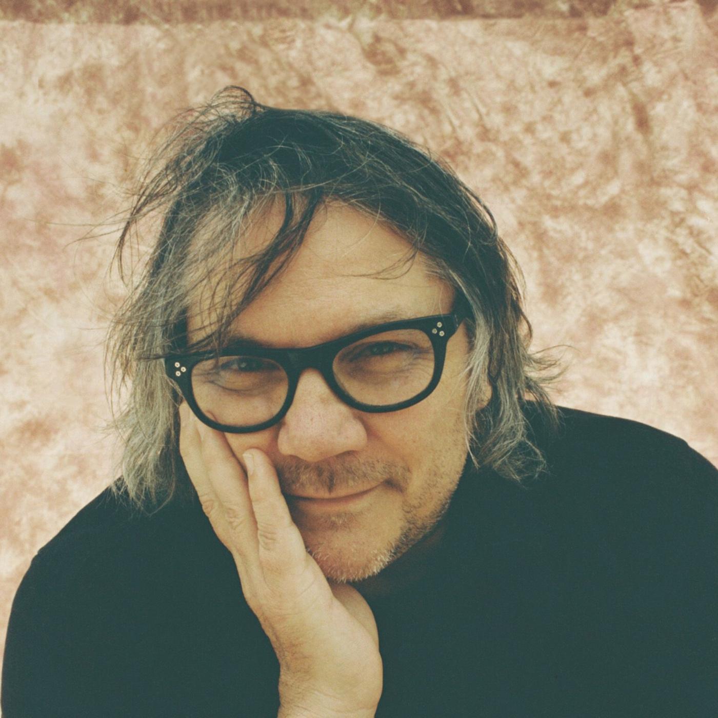 Thumbnail for "Kirsten Johnson, Chris Garcia, and Wilco's Jeff Tweedy ". Thumbnail for "Kirsten Johnson, Chris Garcia, and Wilco's Jeff Tweedy ".