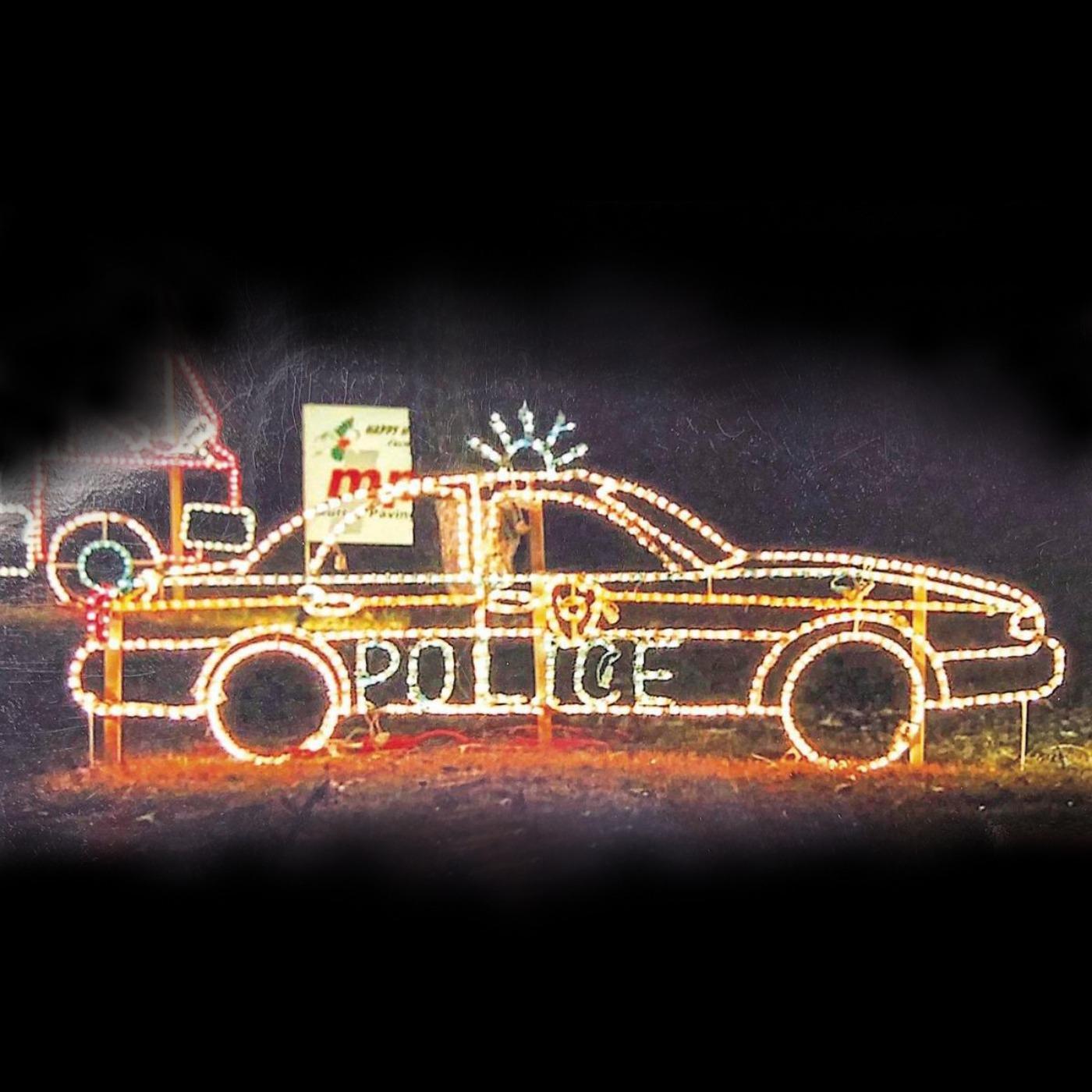 Thumbnail for "The Case of the Christmas Cop Car". Thumbnail for "The Case of the Christmas Cop Car".